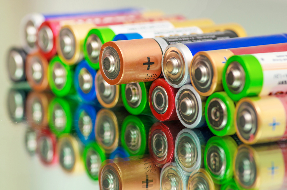 Pile of used alkaline batteries